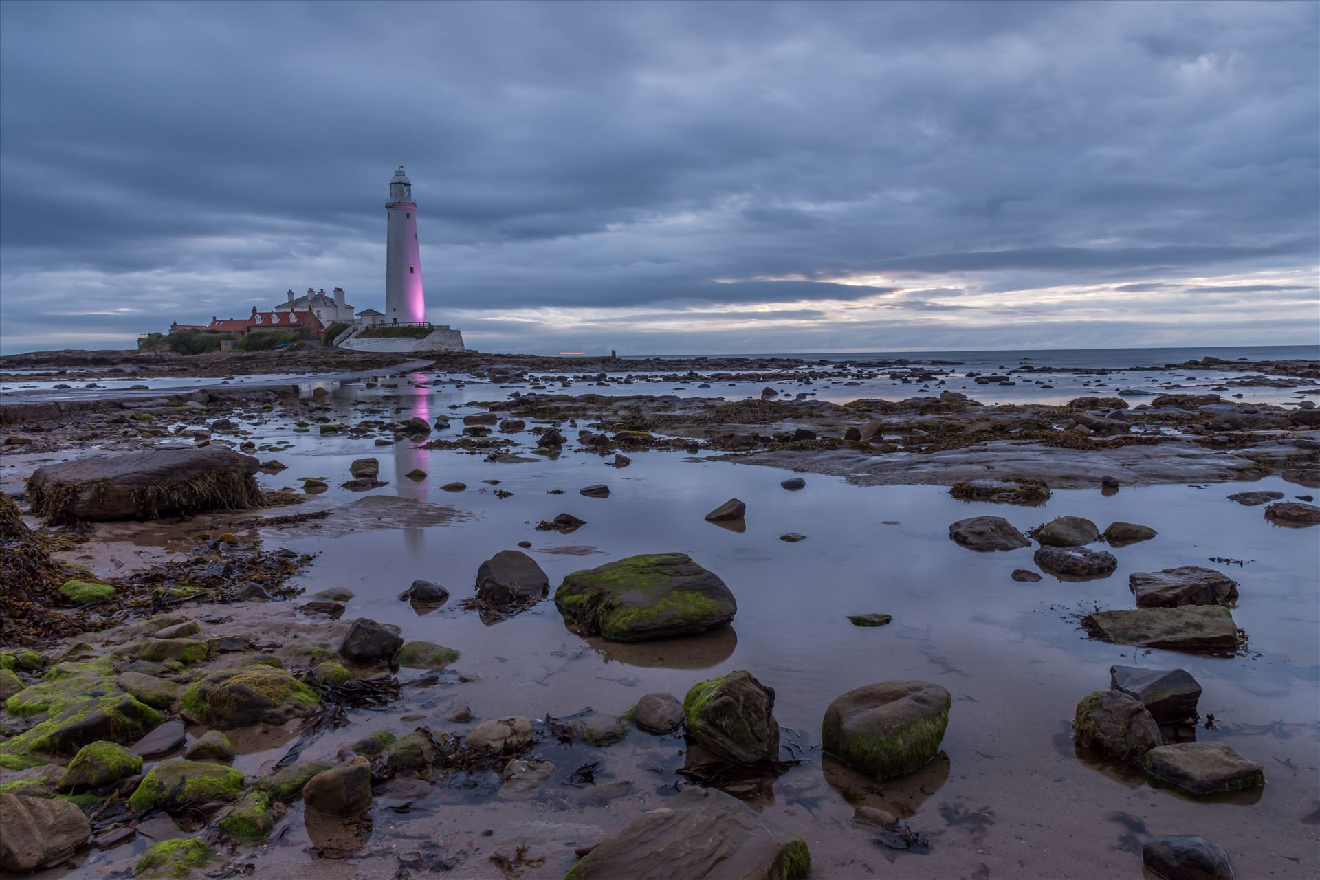 St Mary`s lighthouse, Whitley Bay - St Mary`s lighthouse stands on a small rocky tidal island is linked to the mainland by a short concrete causeway which is submerged at high tide. The lighthouse was built in 1898 & was decommissioned in 1984, 2 years after becoming automatic. by philreay